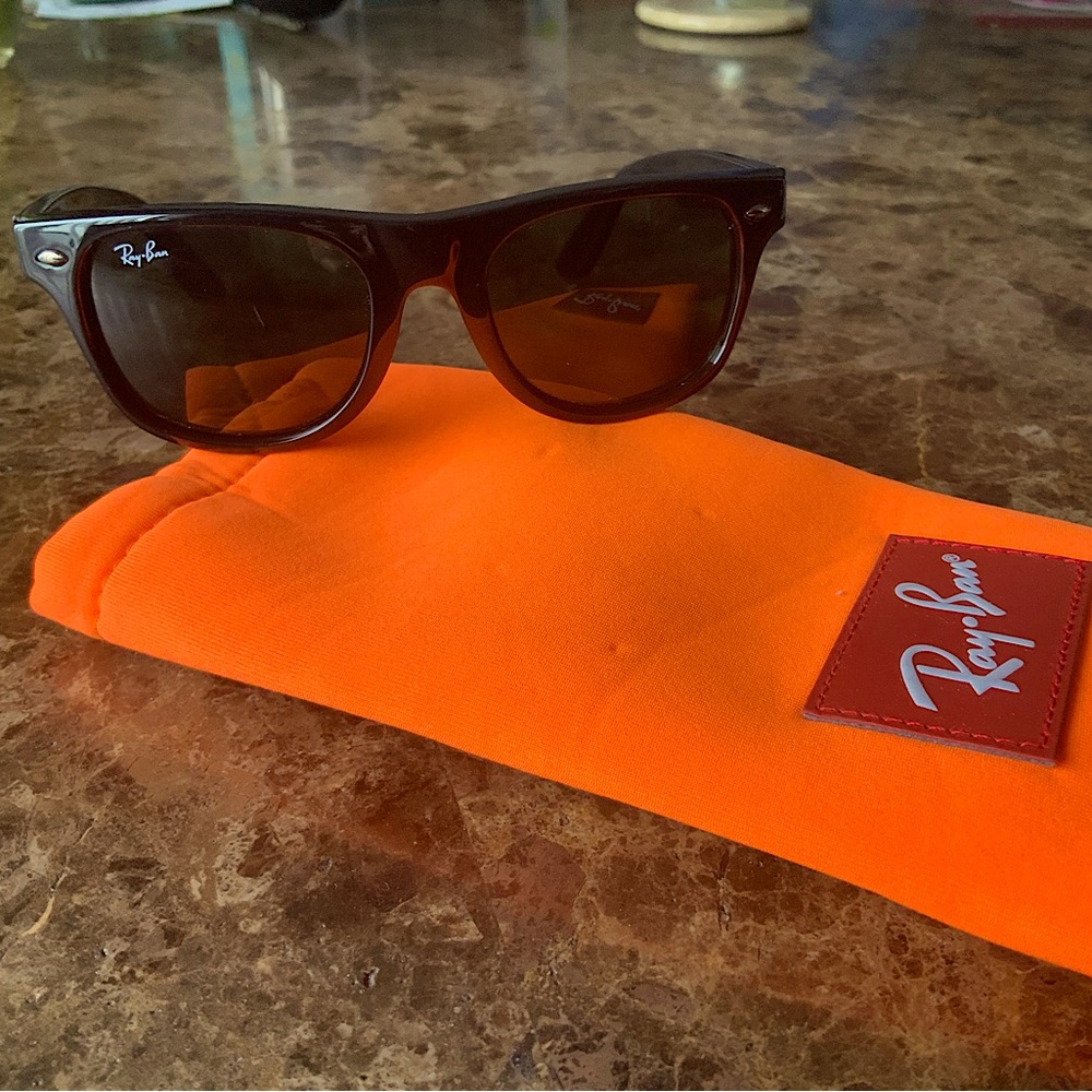 RAY BAN JR. SUNGLASSES: original case included. Scratch on right lens.